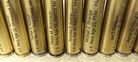 Laser marked bullet casings with names of veterans who were supported by the runners. The runners ran for the name on the casing when it was drawn.